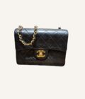 mini sac Chanel cuir agneau noir or 24k vintage
