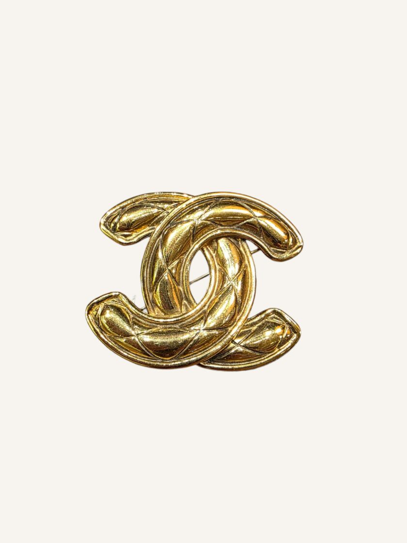 broche Chanel vintage plaqué or CC années 90