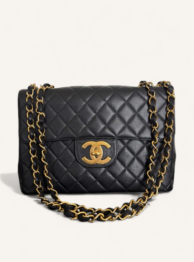 sac Chanel Jumbo vintage cuir caviar noir or 1995