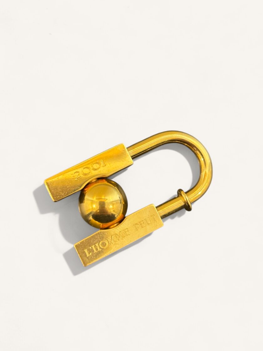 cadenas Hermès doré 2001 l’homme peut embellir la terre