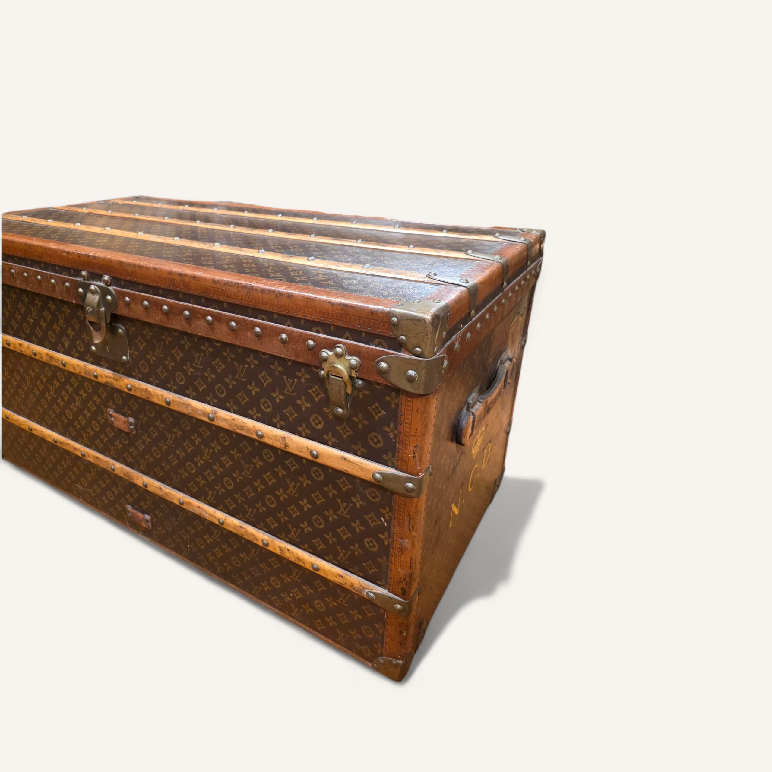 malle Louis Vuitton ancienne toile au pochoir début XXe siècle