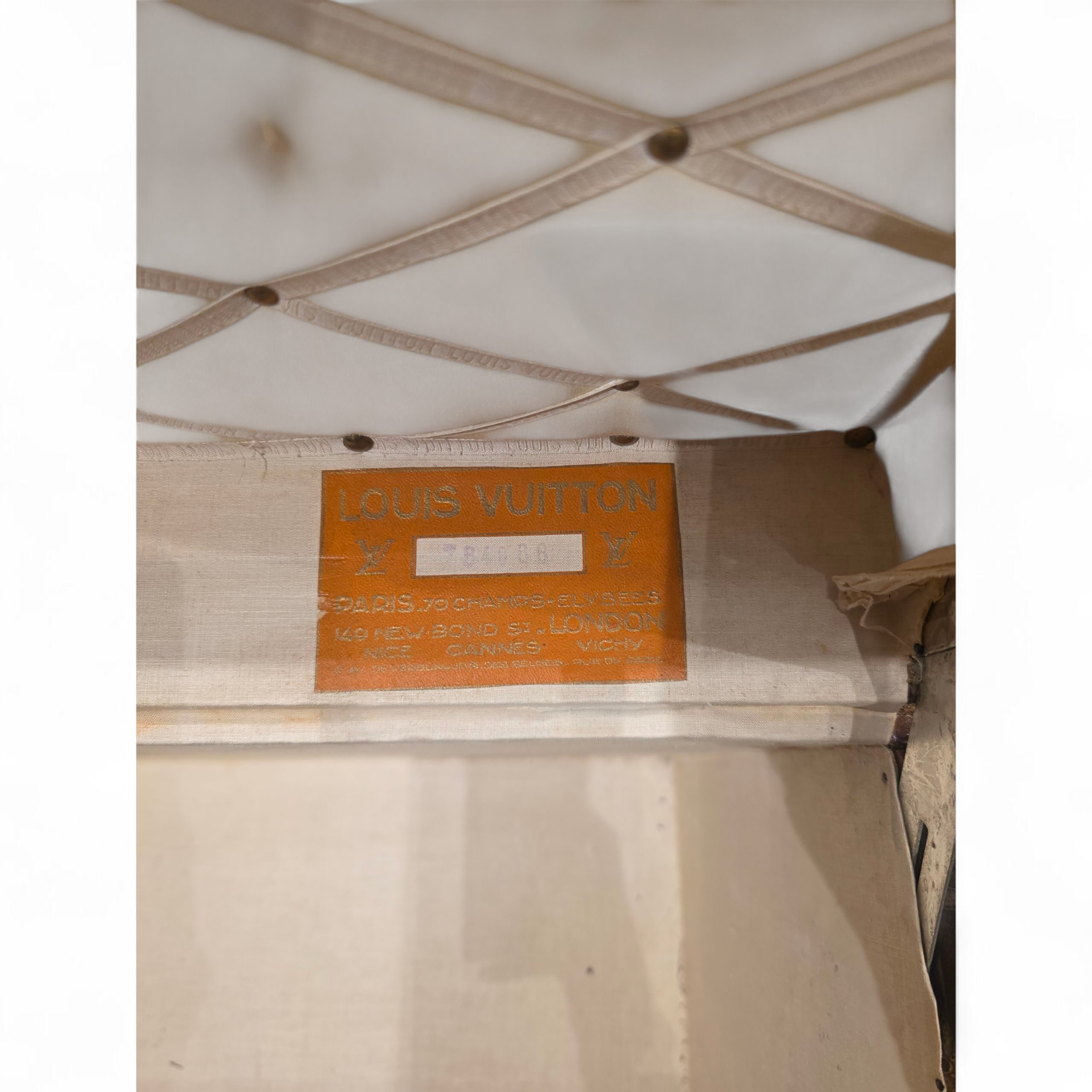 malle Louis Vuitton ancienne toile au pochoir début XXe siècle