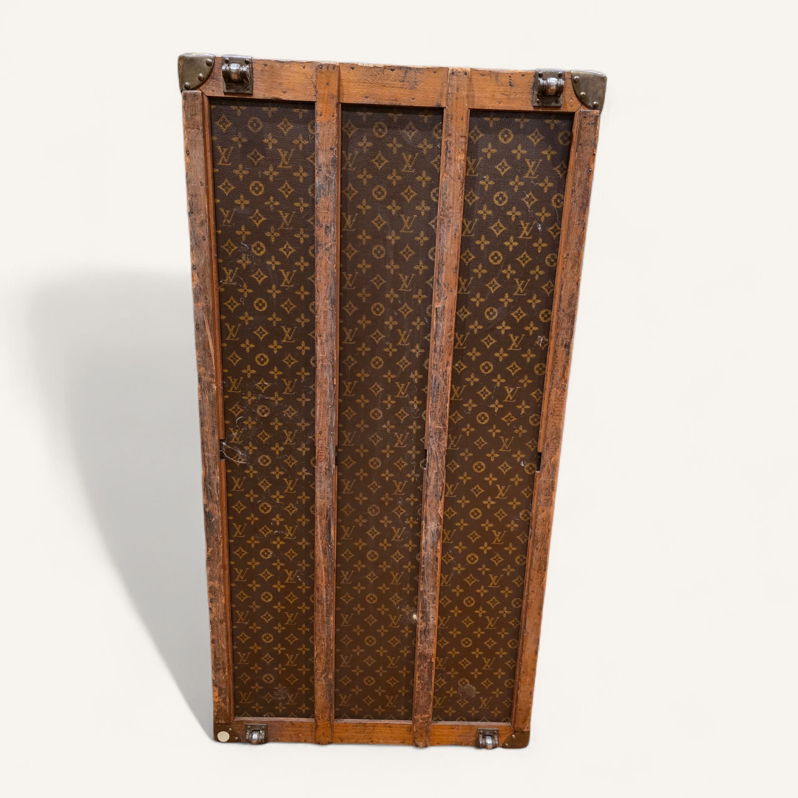 malle Louis Vuitton ancienne toile au pochoir début XXe siècle