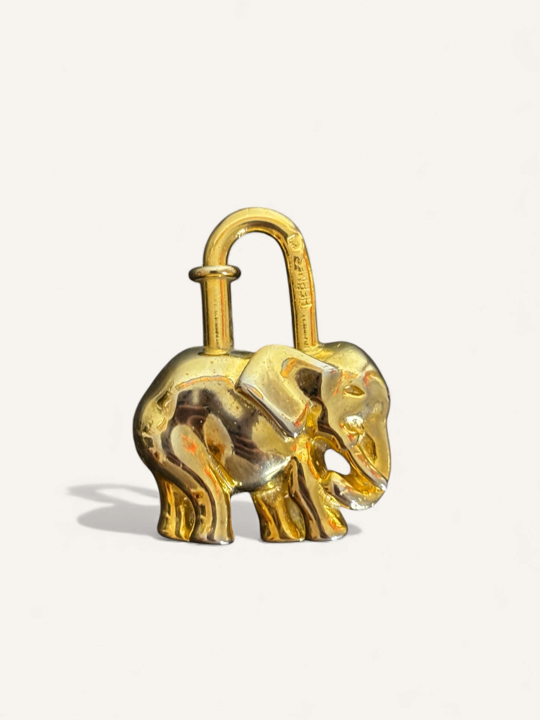 cadenas Hermès éléphant doré vintage