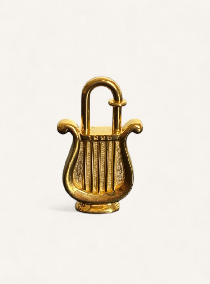 cadenas Hermès doré 1996 année de la musique