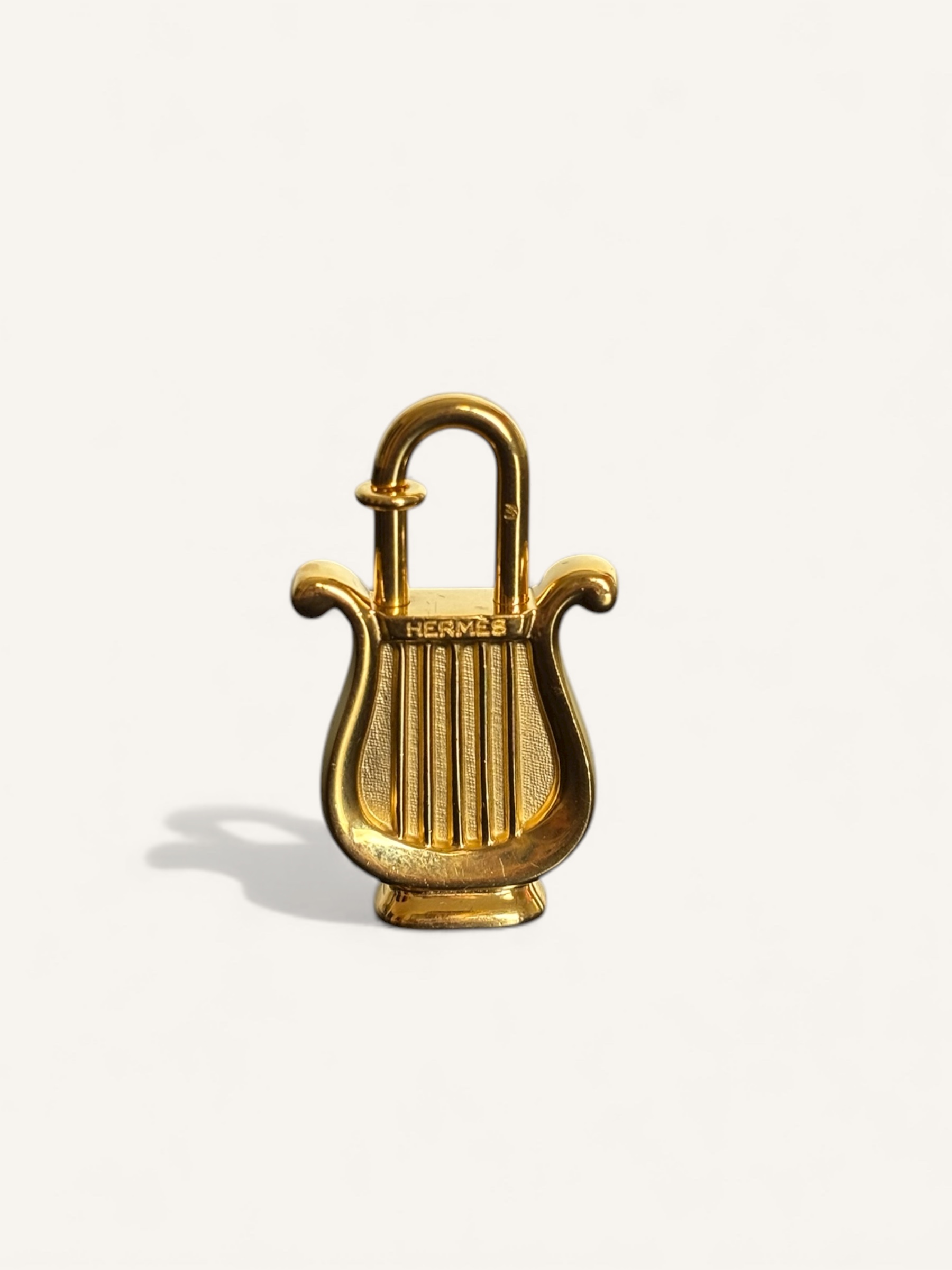 cadenas Hermès doré 1996 année de la musique