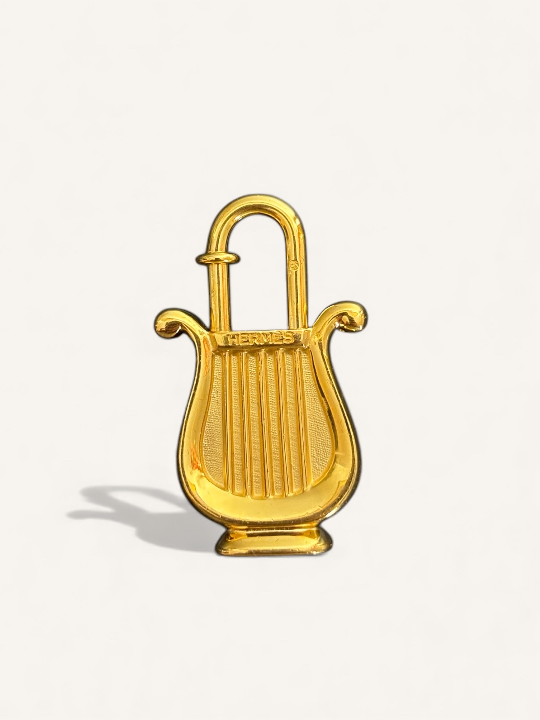 cadenas Hermès doré 1996 année de la musique