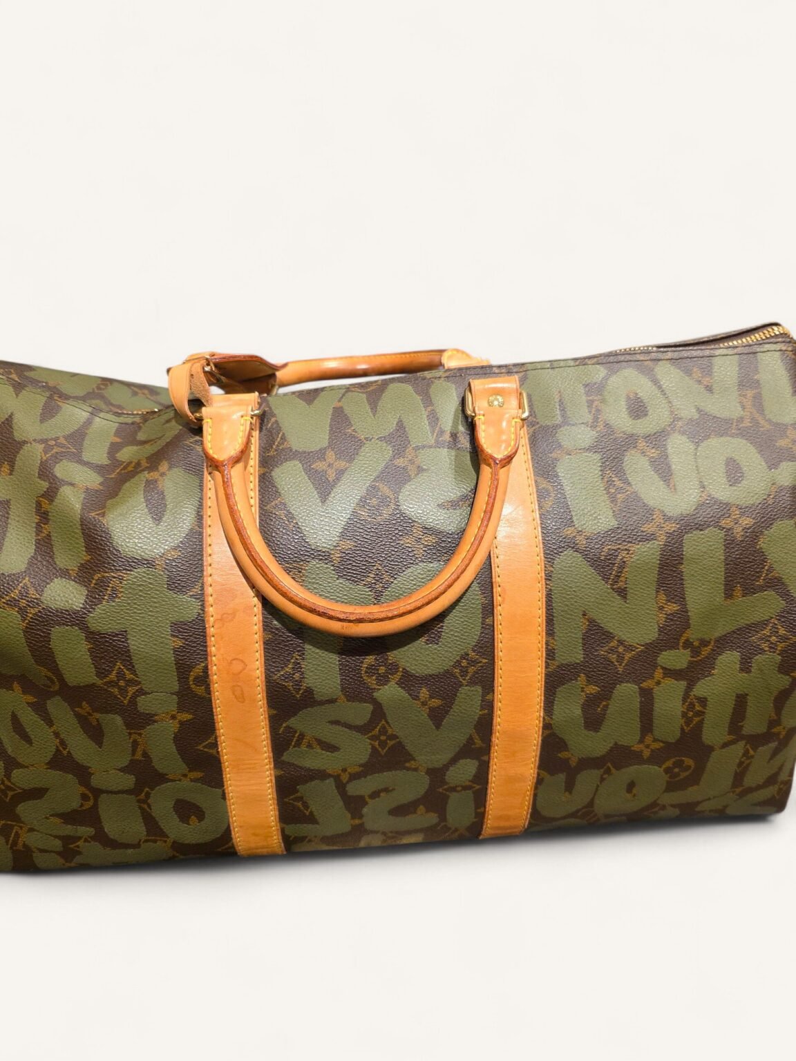 sac Louis Vuitton Keepall 50 Graffiti vert 2001 sac de luxe vintage pour un investissement