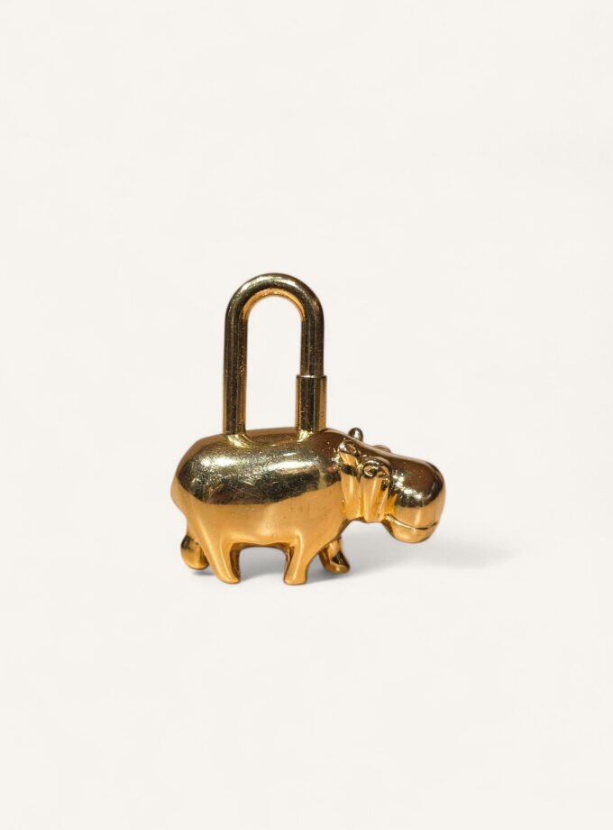 Bijou de sac Hermès Hippopotame Doré