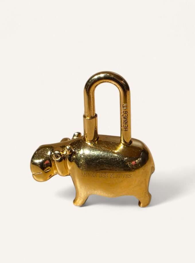 Bijou de sac Hermès Hippopotame Doré