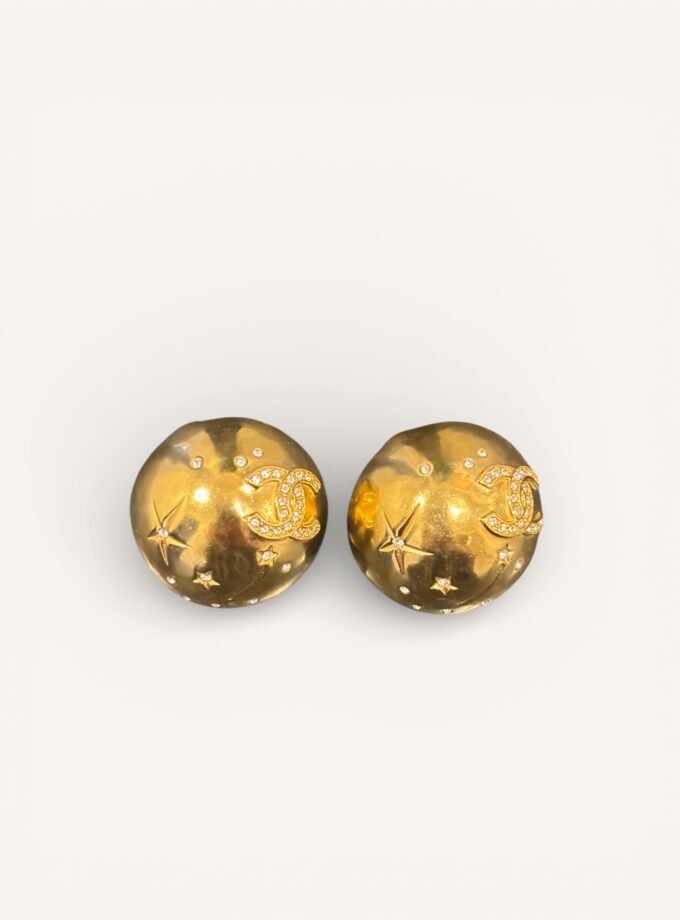 boucles d’oreilles Chanel étoile comète dorées